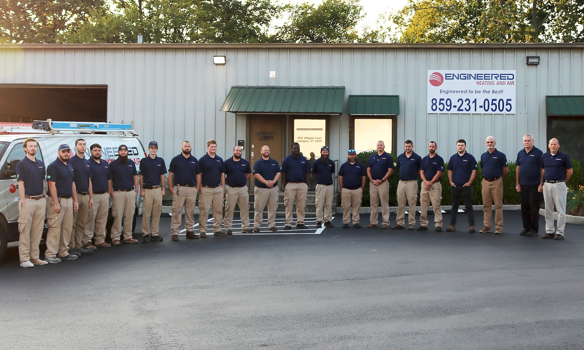 a group of people standing in front of a building